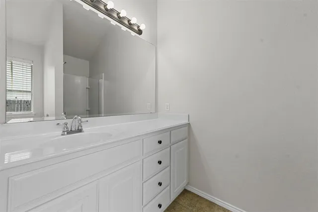 a white bath tub sitting next to a window