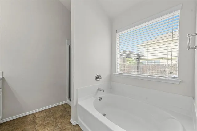 a house view with a backyard space