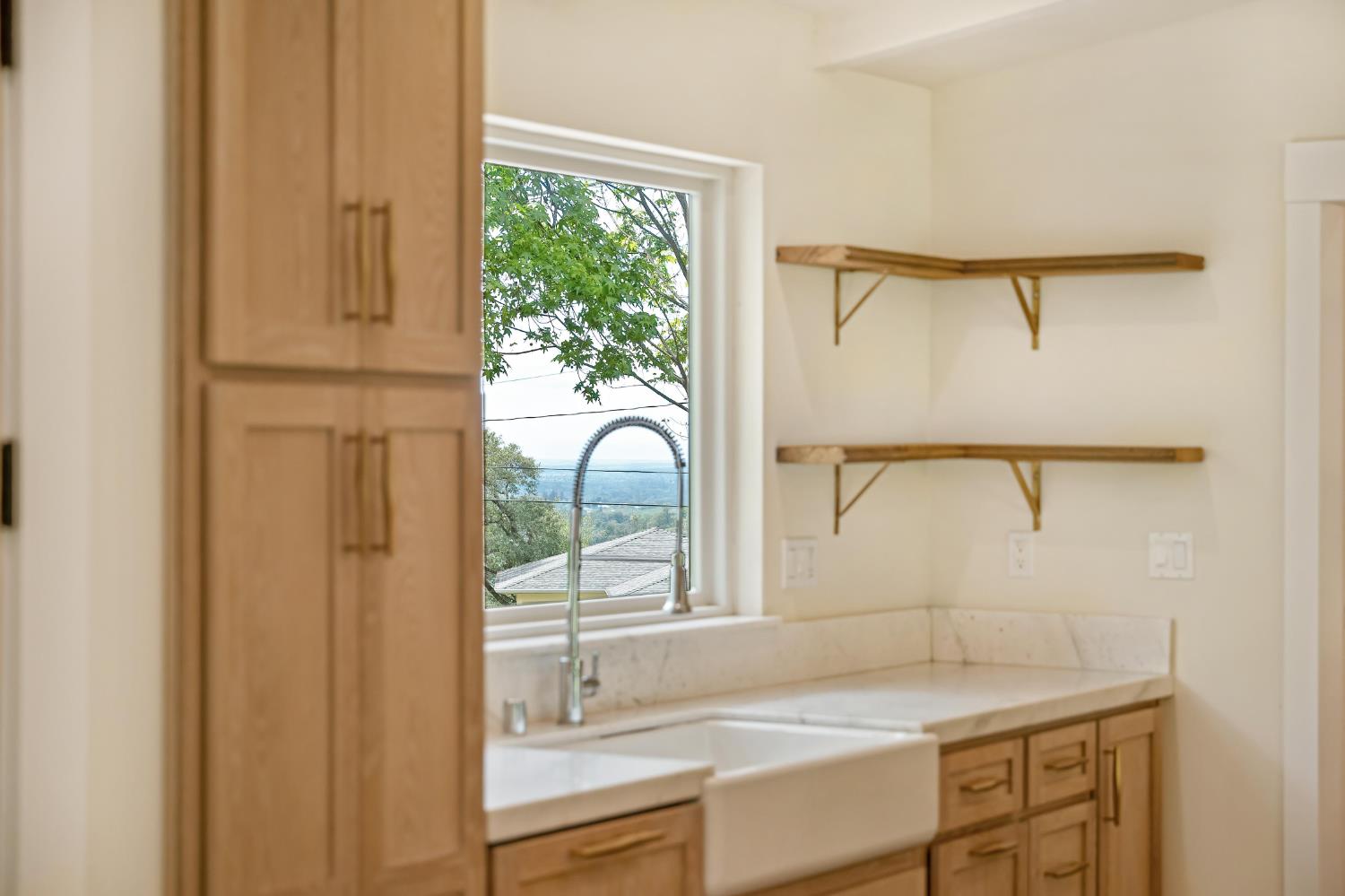 8495 Chili Hill Road Newcastle, CA 95658 - Photo 9 of 56 a bathroom with a sink and a mirror