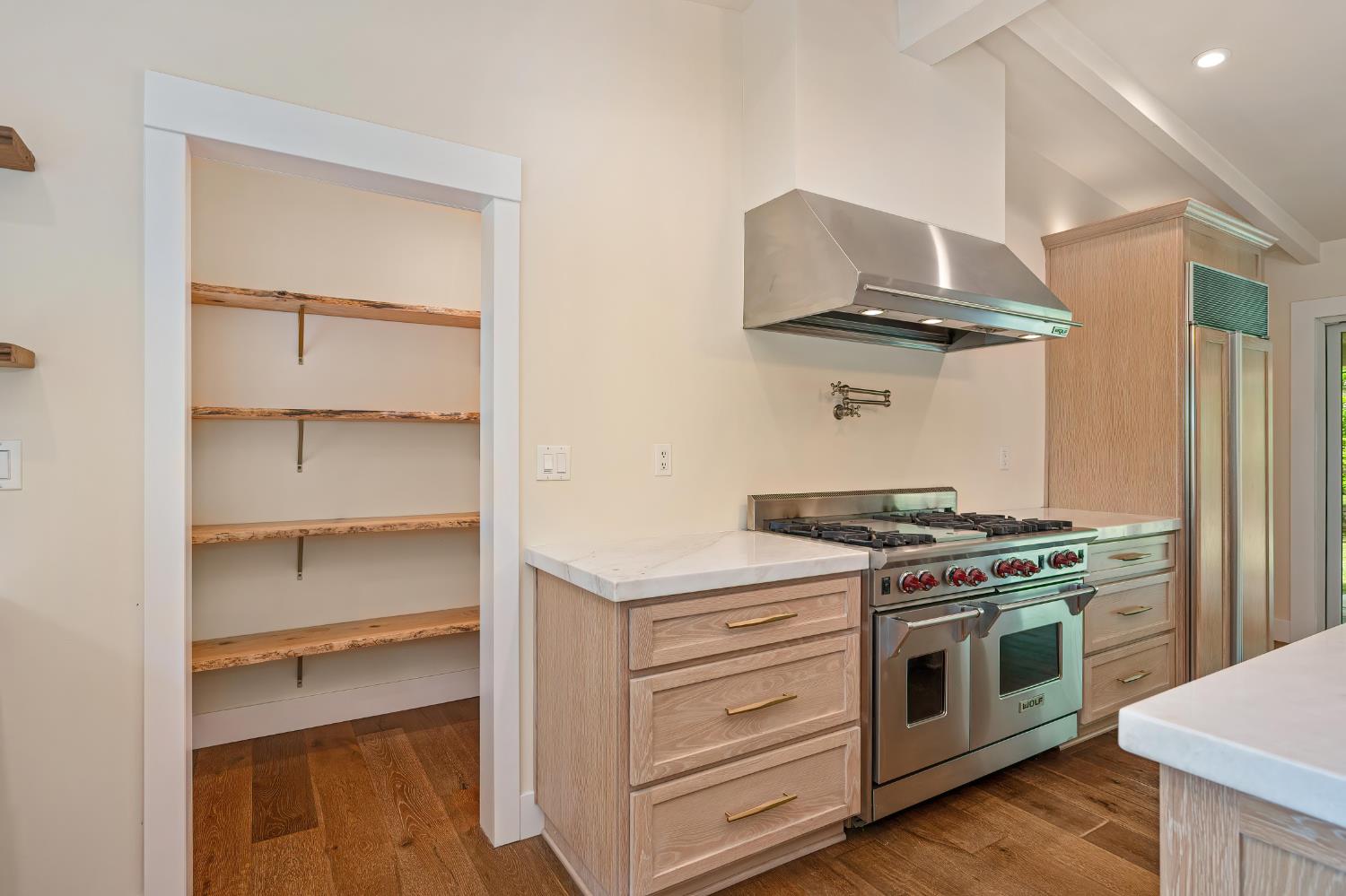 8495 Chili Hill Road Newcastle, CA 95658 - Photo 10 of 56 a kitchen with a stove and a sink