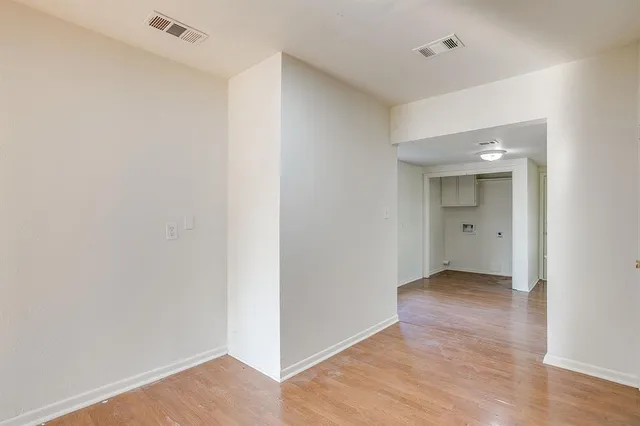a kitchen with stainless steel appliances granite countertop a sink and a stove