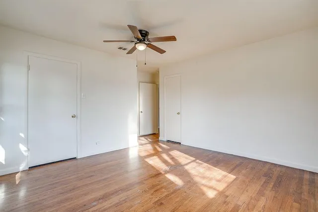 a view of a room that has a window in it