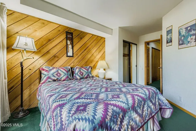 a bathroom with a sink a mirror and a shower
