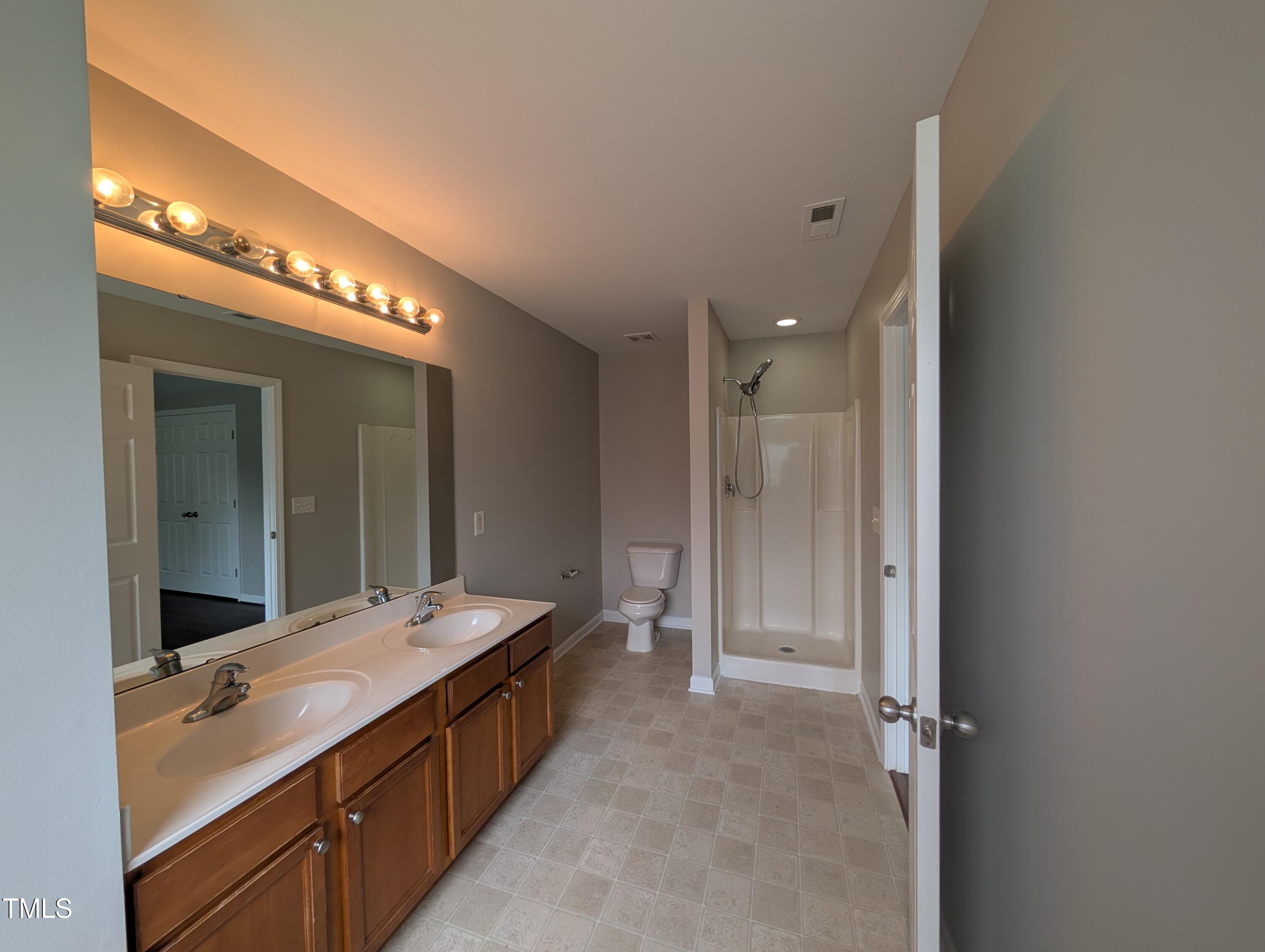 3405 Mogollon Court Raleigh, NC 27610 - Photo 11 of 12 PXL_20250630_161159216.RAW-01.COVER