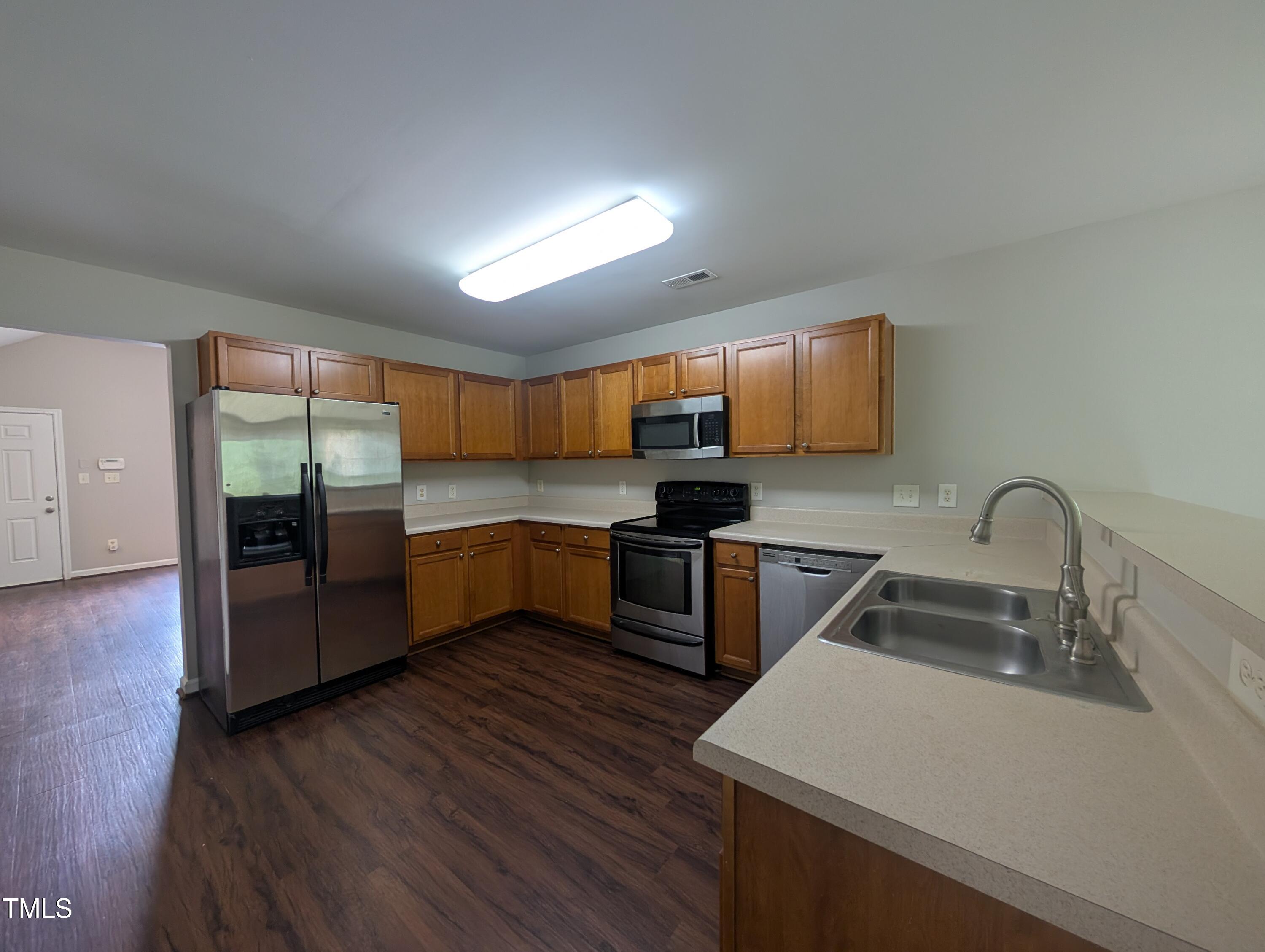 3405 Mogollon Court Raleigh, NC 27610 - Photo 2 of 12 PXL_20250630_160828110.RAW-01.COVER