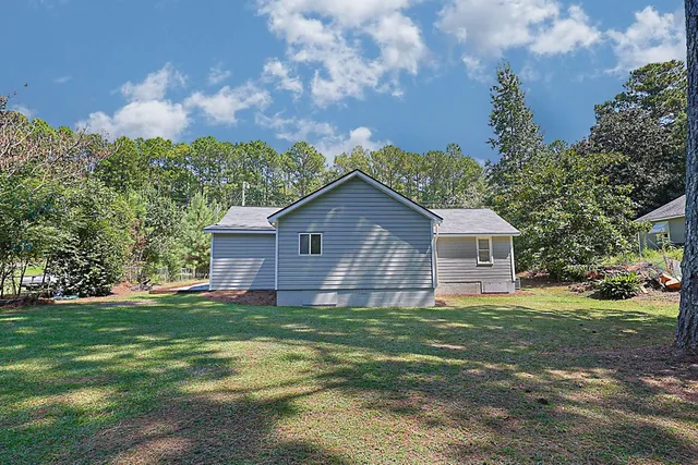 a house view with a garden space