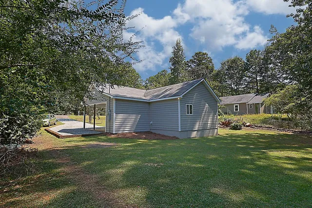 a house view with a garden space