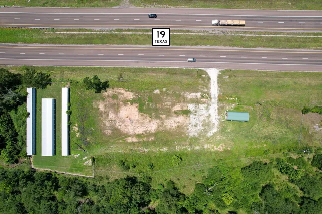 a view of a garden with a bench