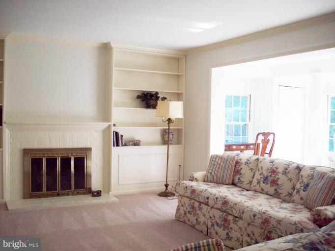8701 Bradgate Road Alexandria, VA 22308 - Photo 3 of 17 Gas Fireplace Plus Mantle and Built in Bookcases