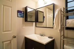 a bathroom with a sink and a mirror