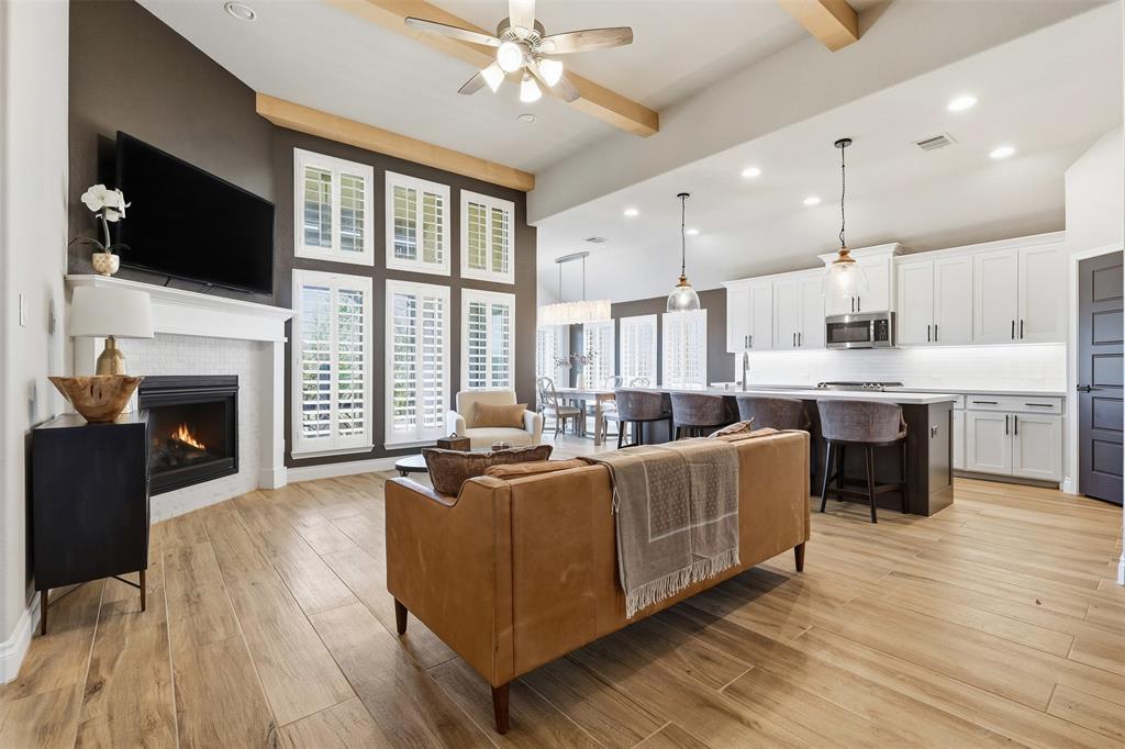 5640 Pradera Road Fort Worth, TX 76126 - Photo 5 of 35 Vaulted ceiling with wood-finish beams and a ceiling fan