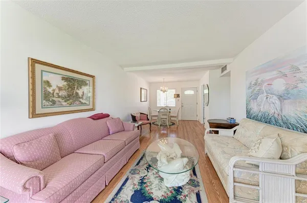 a living room with furniture and a couch