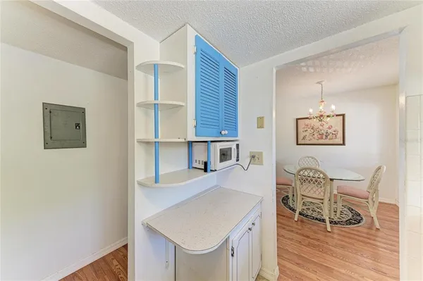 a room with furniture and a wooden floor