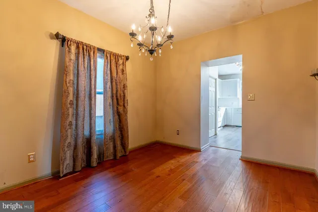 a view of a livingroom with wooden floor