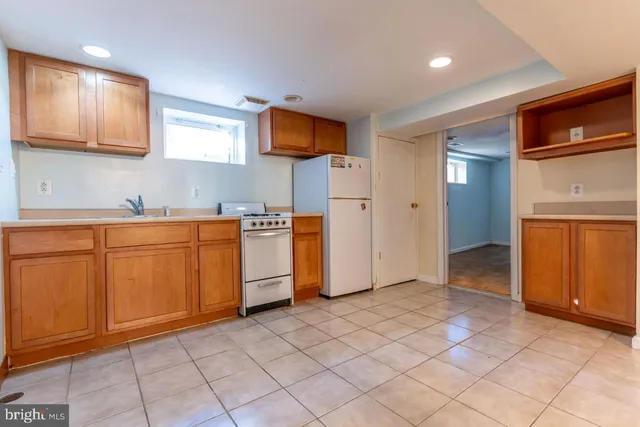 a view of a kitchen with electric appliances