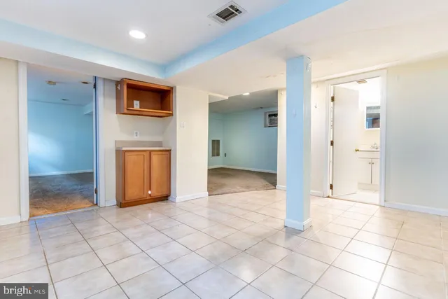 a view of an empty room and window