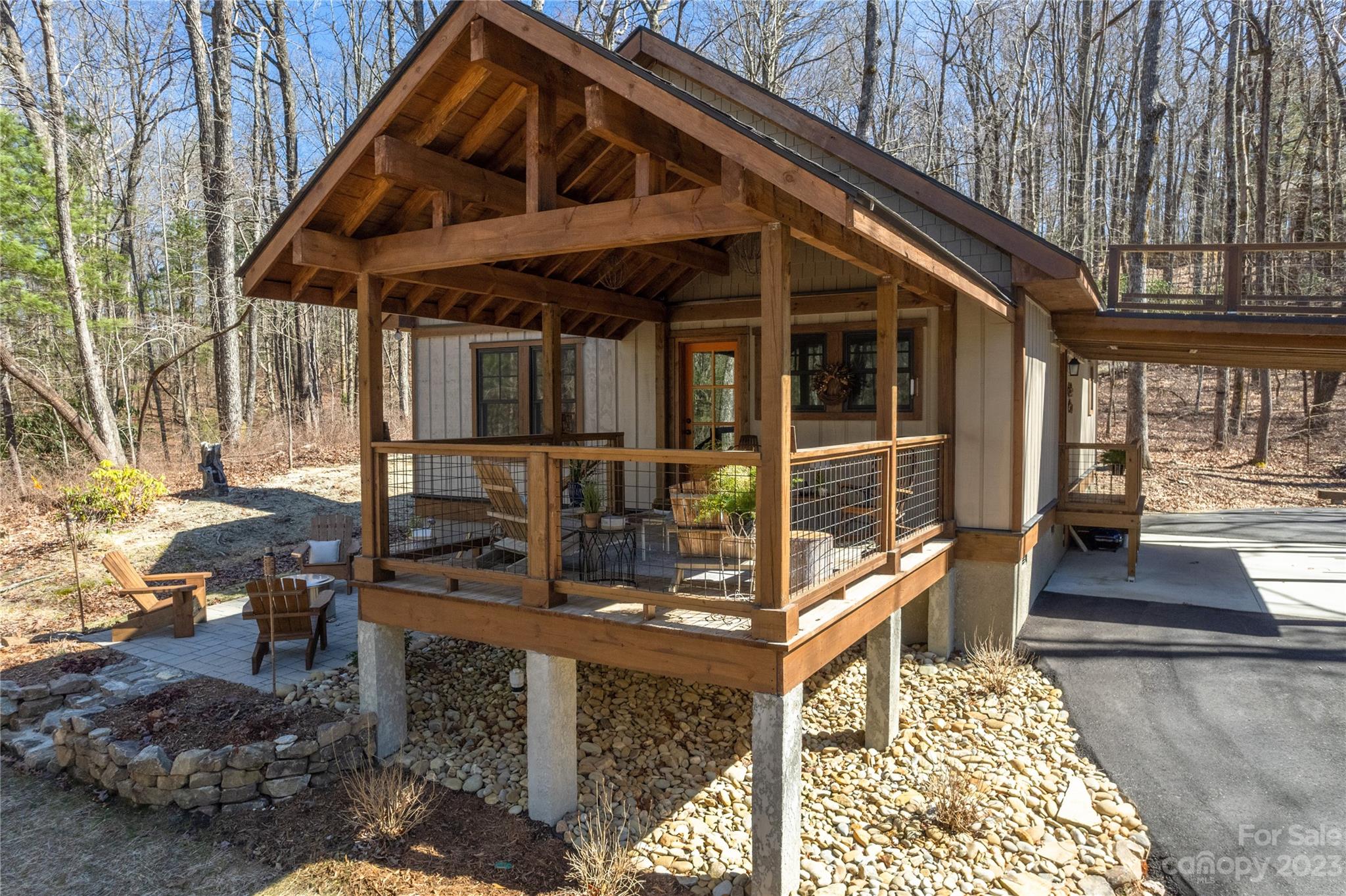 853 Cardinal Road Brevard, NC 28712 - Photo 2 of 28 a view of house with outdoor seating