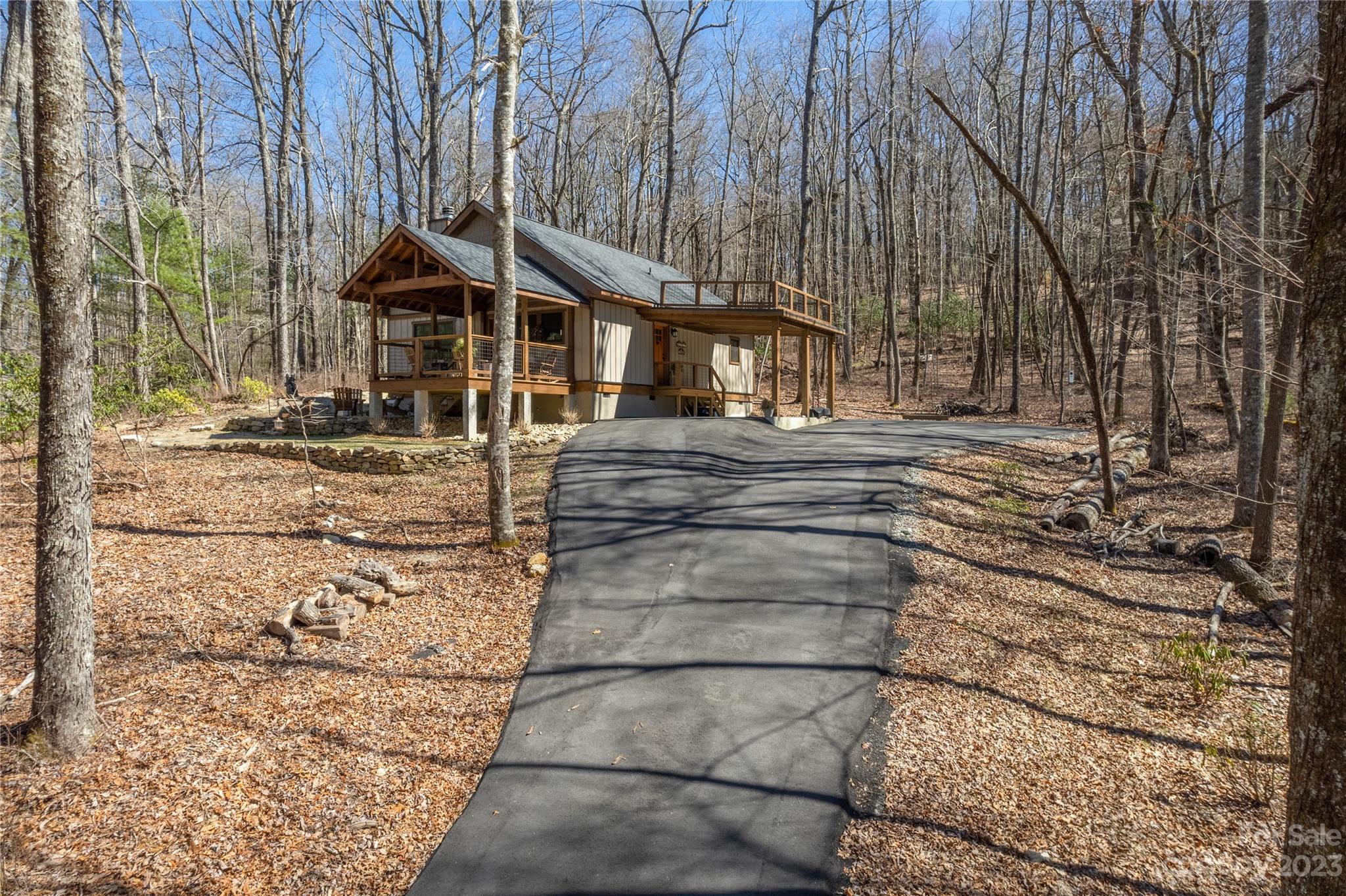 853 Cardinal Road Brevard, NC 28712 - Photo 25 of 28 a view of a house with a yard