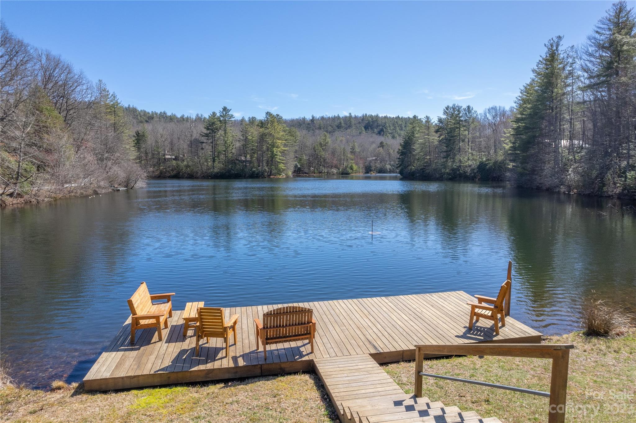 853 Cardinal Road Brevard, NC 28712 - Photo 27 of 28 a view of a lake from a balcony with outdoor seating
