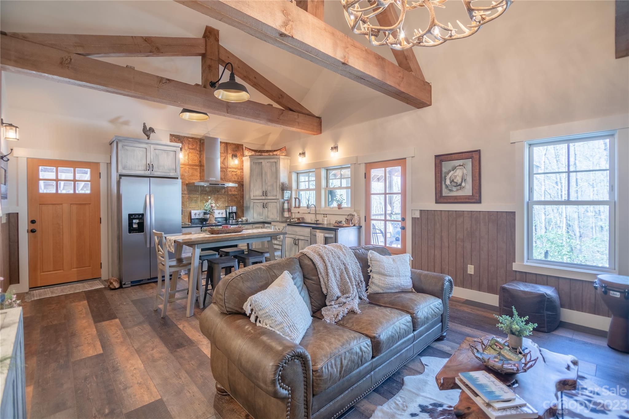 853 Cardinal Road Brevard, NC 28712 - Photo 4 of 28 a living room with furniture and a large window