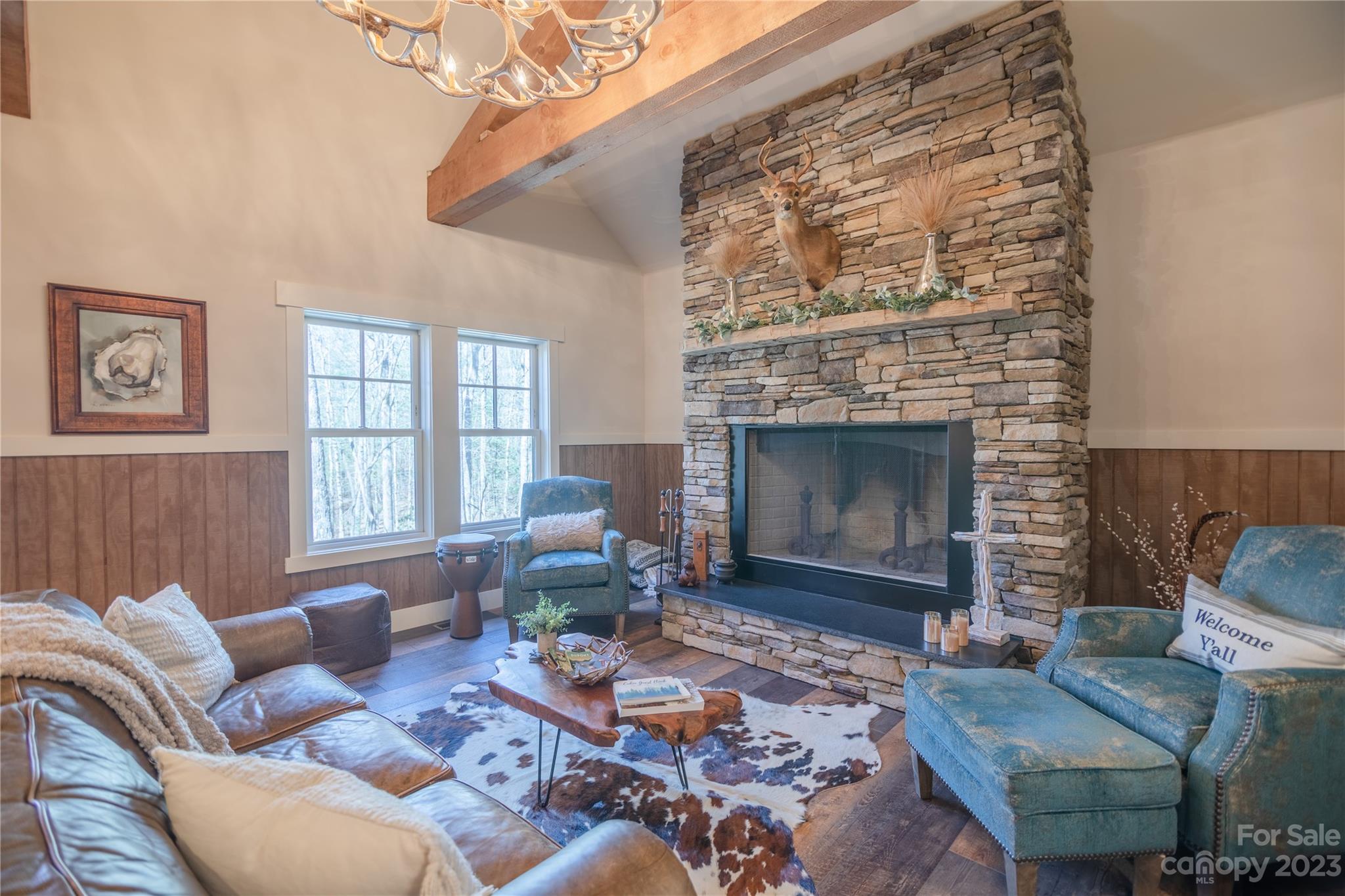 853 Cardinal Road Brevard, NC 28712 - Photo 7 of 28 a living room with furniture and a fireplace
