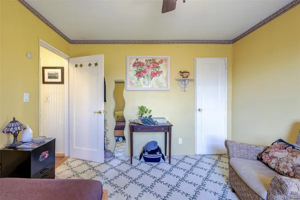 a bedroom with a bed and furniture