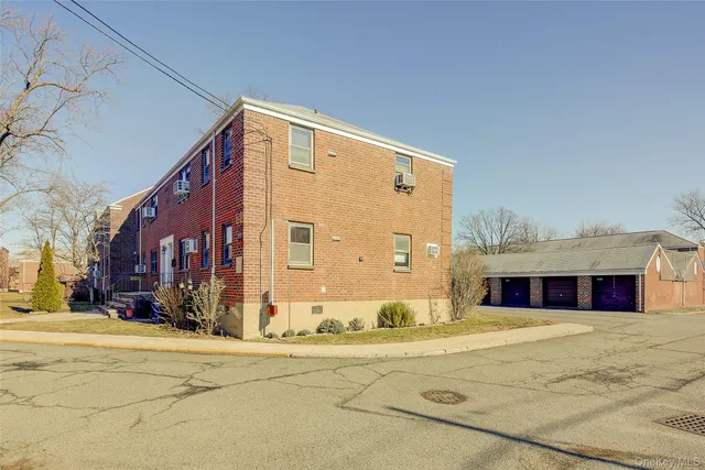 a view of a building along the road