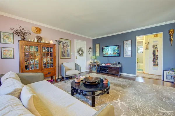 a living room with furniture and window