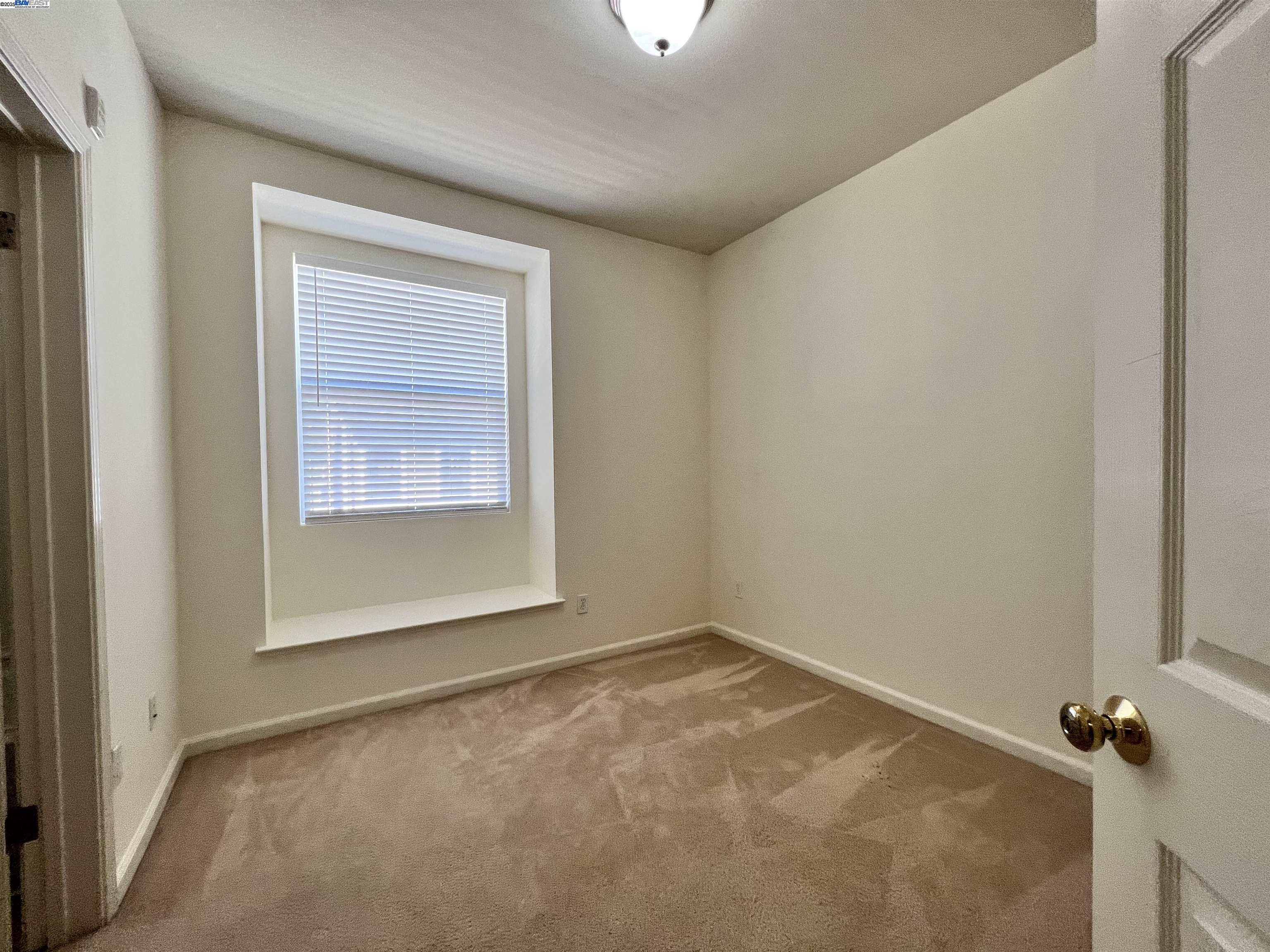 4331 Westerly Common Fremont, CA 94538 - Photo 14 of 24 a view of an empty room with a window