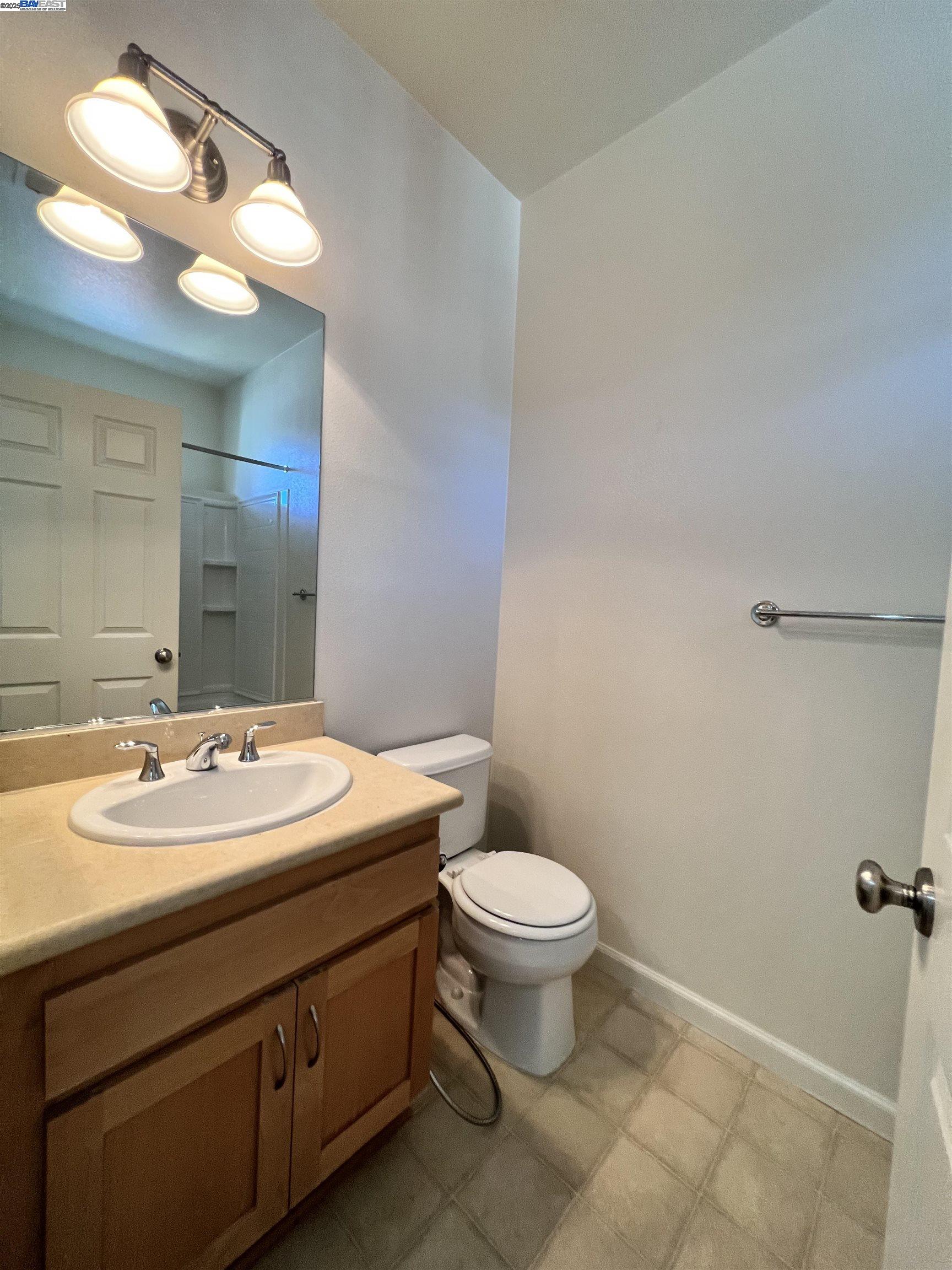 4331 Westerly Common Fremont, CA 94538 - Photo 15 of 24 a bathroom with a sink and a mirror