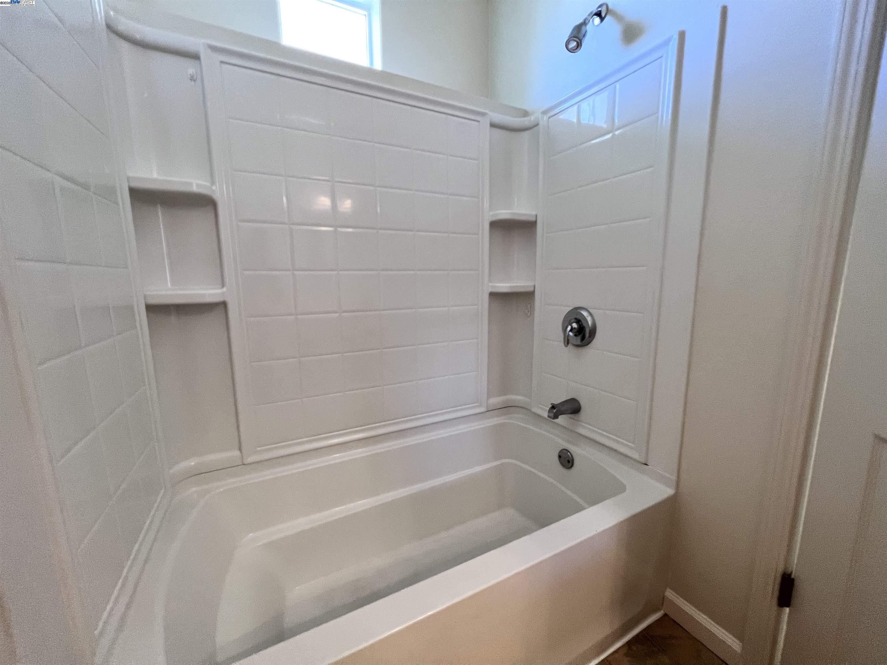 4331 Westerly Common Fremont, CA 94538 - Photo 16 of 24 a bathroom with a bathtub