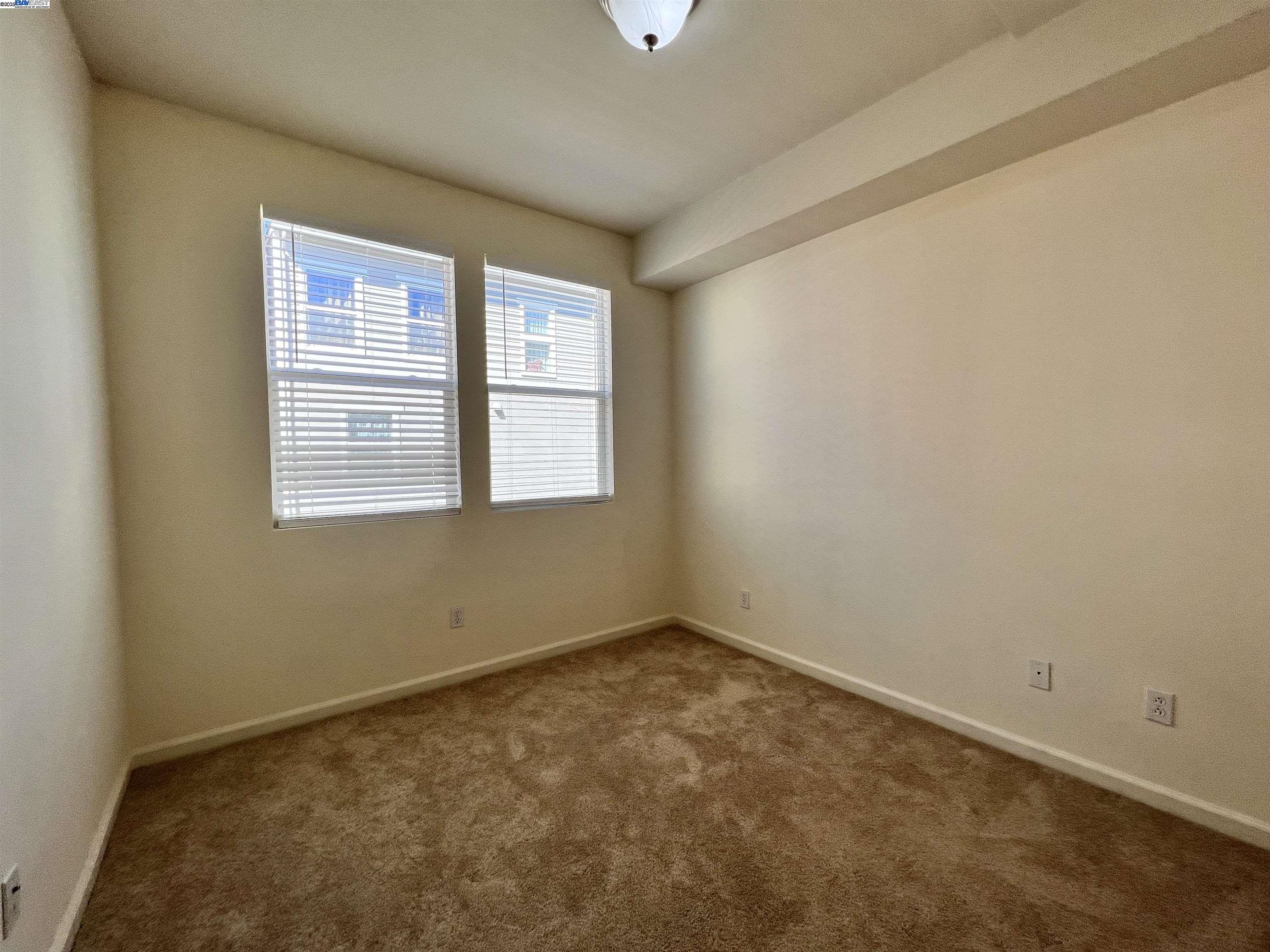 4331 Westerly Common Fremont, CA 94538 - Photo 10 of 24 a view of an empty room with a window
