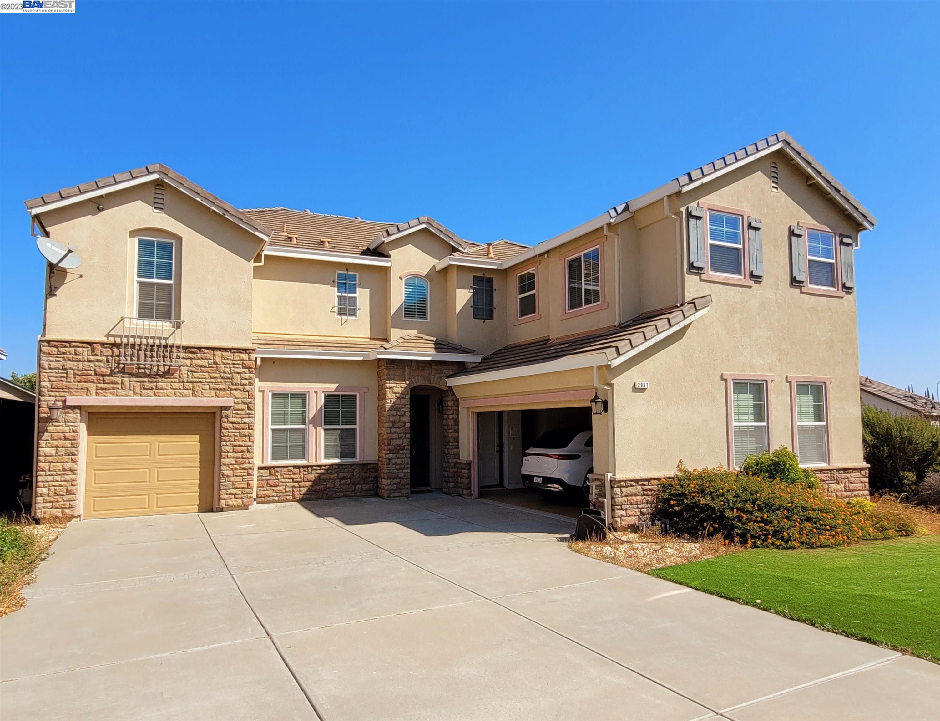 2957 Pilar Ridge Drive Bay Point, CA 94565 - Photo 1 of 1 a front view of a house with a yard