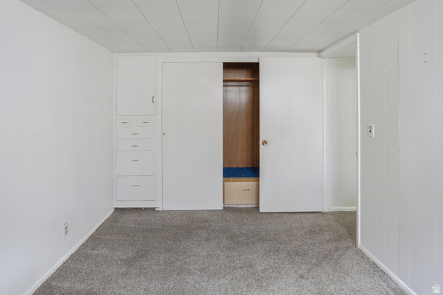774 37th Street South Ogden, UT 84403 - Photo 23 of 47 Interior room featuring light gray carpet flooring, white painted walls, and a white paneled ceiling