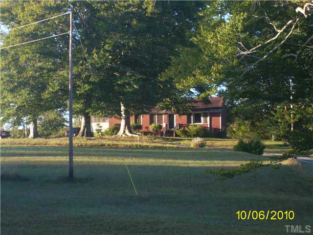 1441 Haywood Bailey Road Roxboro, NC 27574 - Photo 2 of 3 a view of a house with a big yard