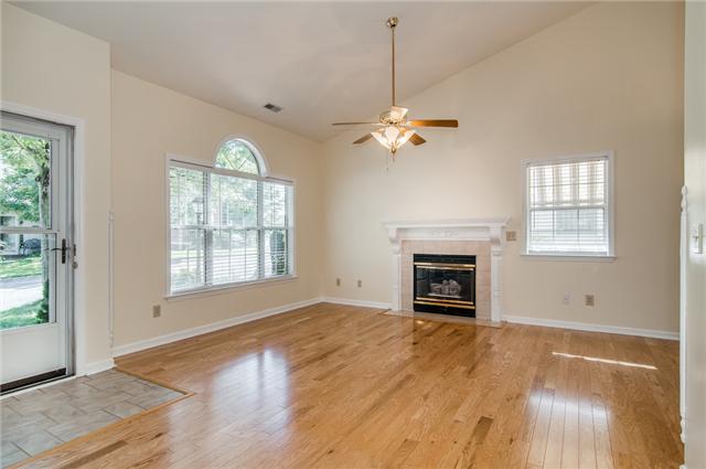 2033 Roderick Circle Franklin, TN 37064 - Photo 2 of 20 Huge great room with hard wood floors and cozy fireplace and vaulted ceiling.