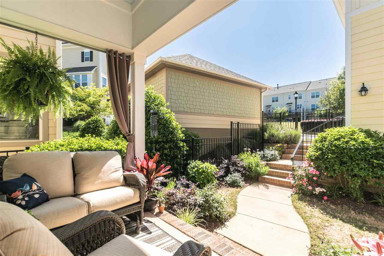 1407 Rodessa Run Raleigh, NC 27607 - Photo 24 of 30 Beautiful Covered Patio and Custom Landscaping