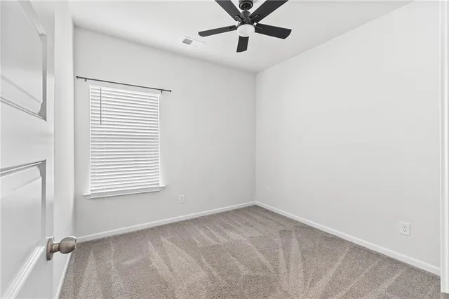 a view of a window in an empty room