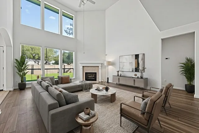 a large kitchen with stainless steel appliances granite countertop a stove sink and cabinets