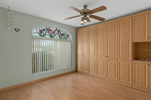 a view of a hallway with a workspace