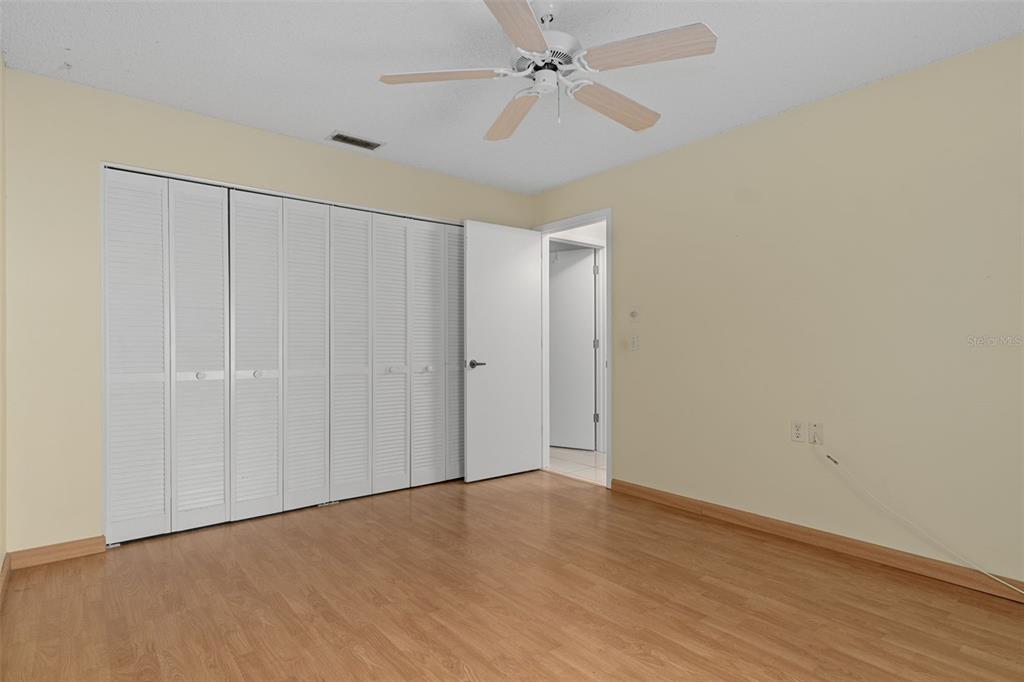 2321 Terrace View Lane Spring Hill, FL 34606 - Photo 31 of 41 a view of an empty room with wooden floor