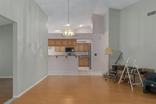 a view of kitchen and chandelier