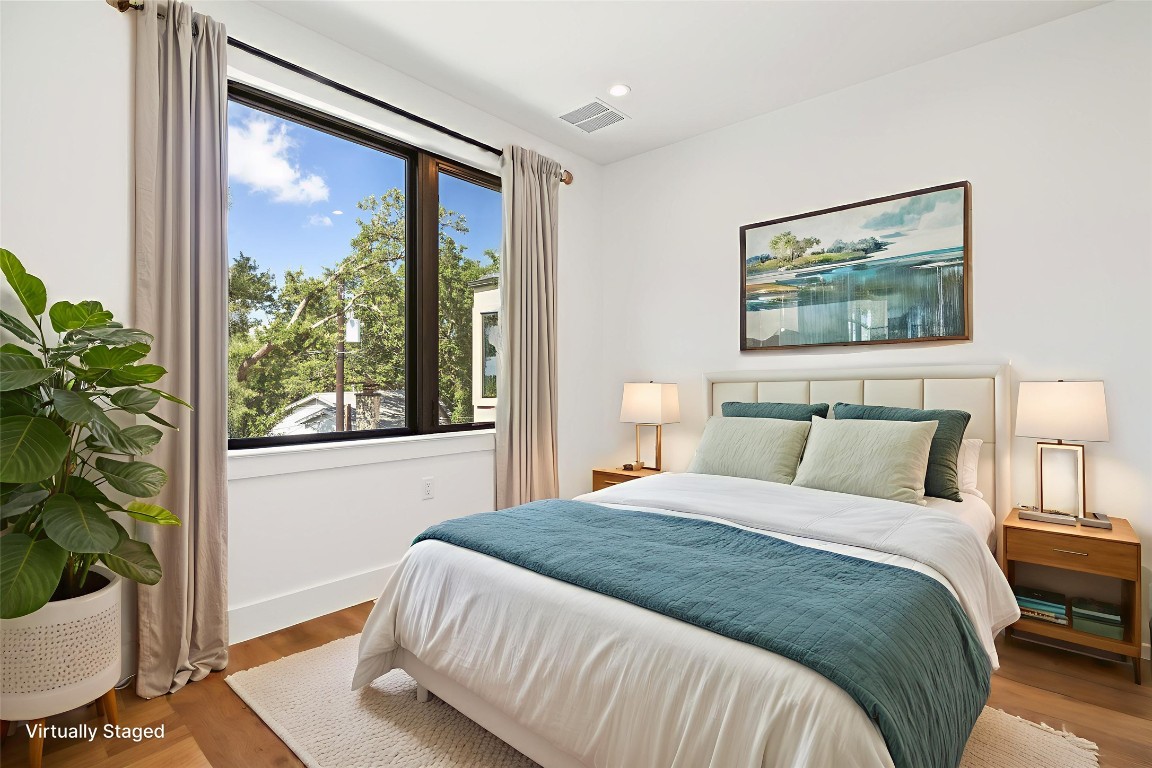 3208 Clawson Road, Unit 4A Austin, TX 78704 - Photo 13 of 28 a bedroom with a large bed and a window