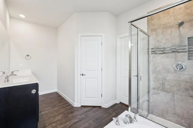 a view of a backyard with table and chairs
