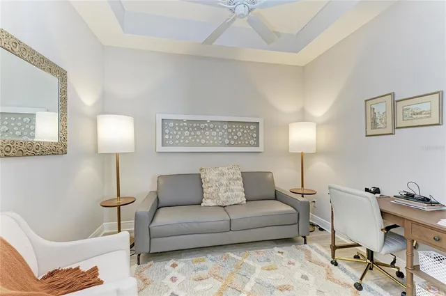 a living room with furniture and a table