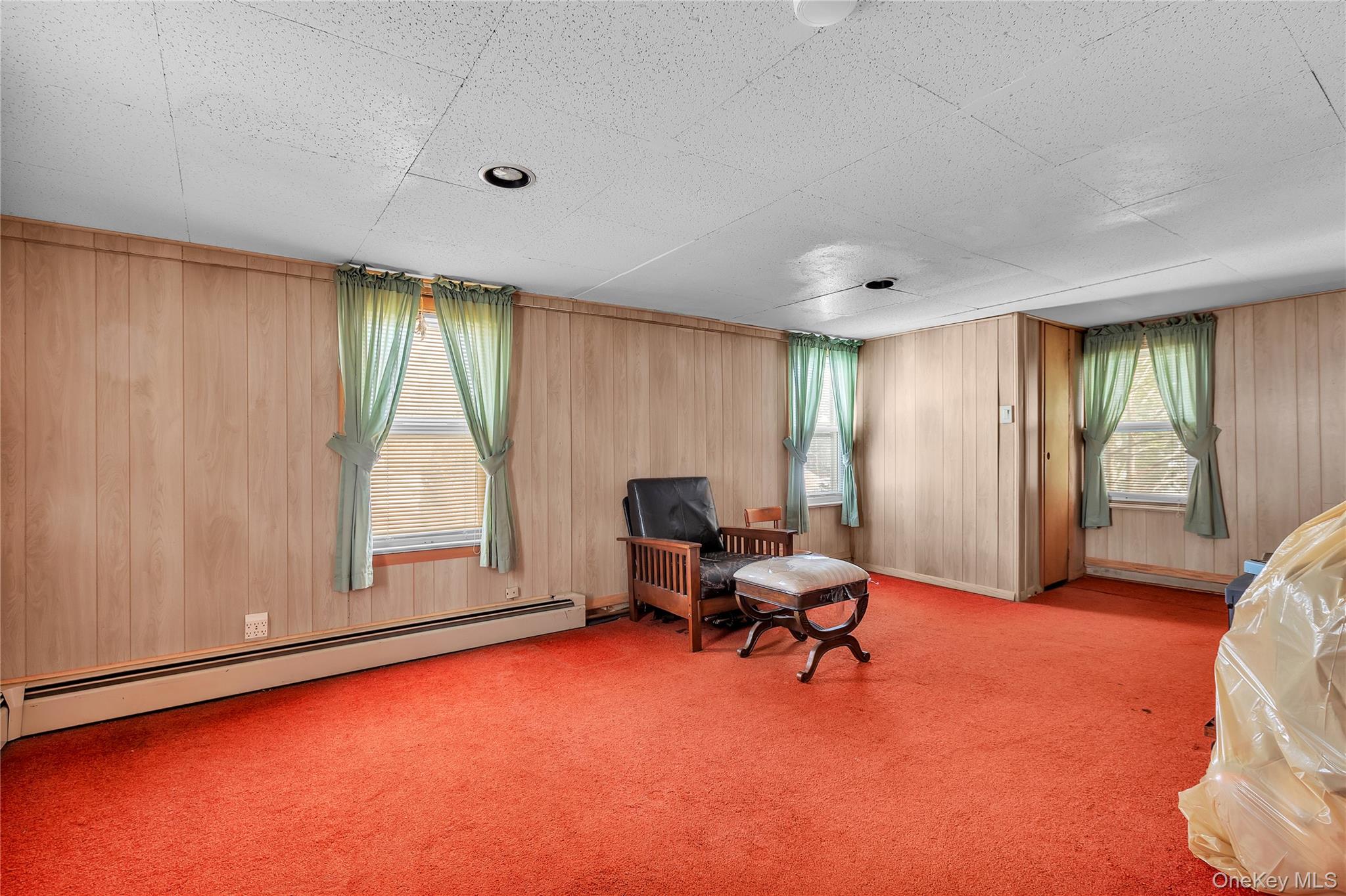 956 Paulding Street Peekskill, NY 10566 - Photo 11 of 27 a view of a livingroom with workspace and a window