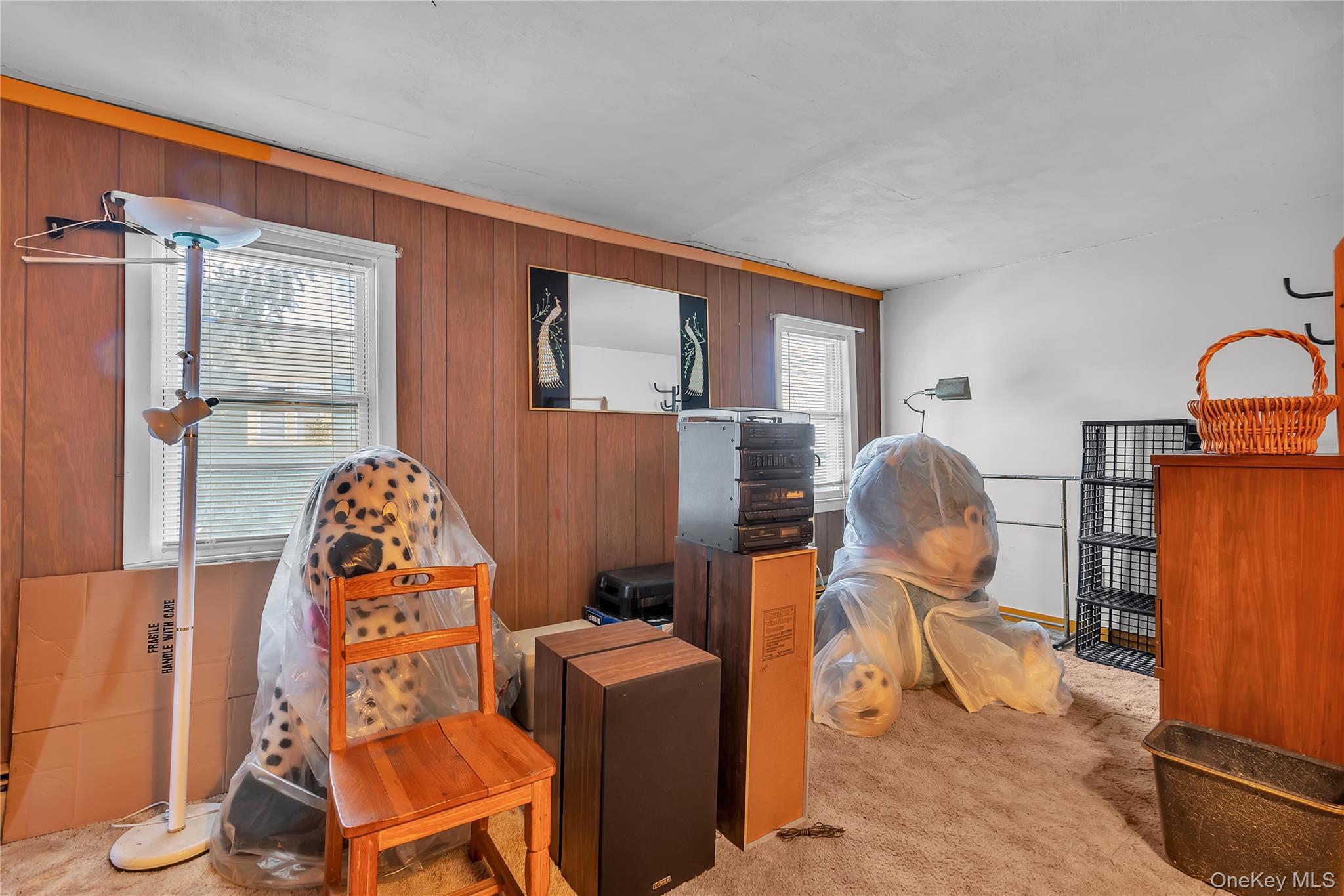 956 Paulding Street Peekskill, NY 10566 - Photo 12 of 27 a view of a workspace with furniture and a window