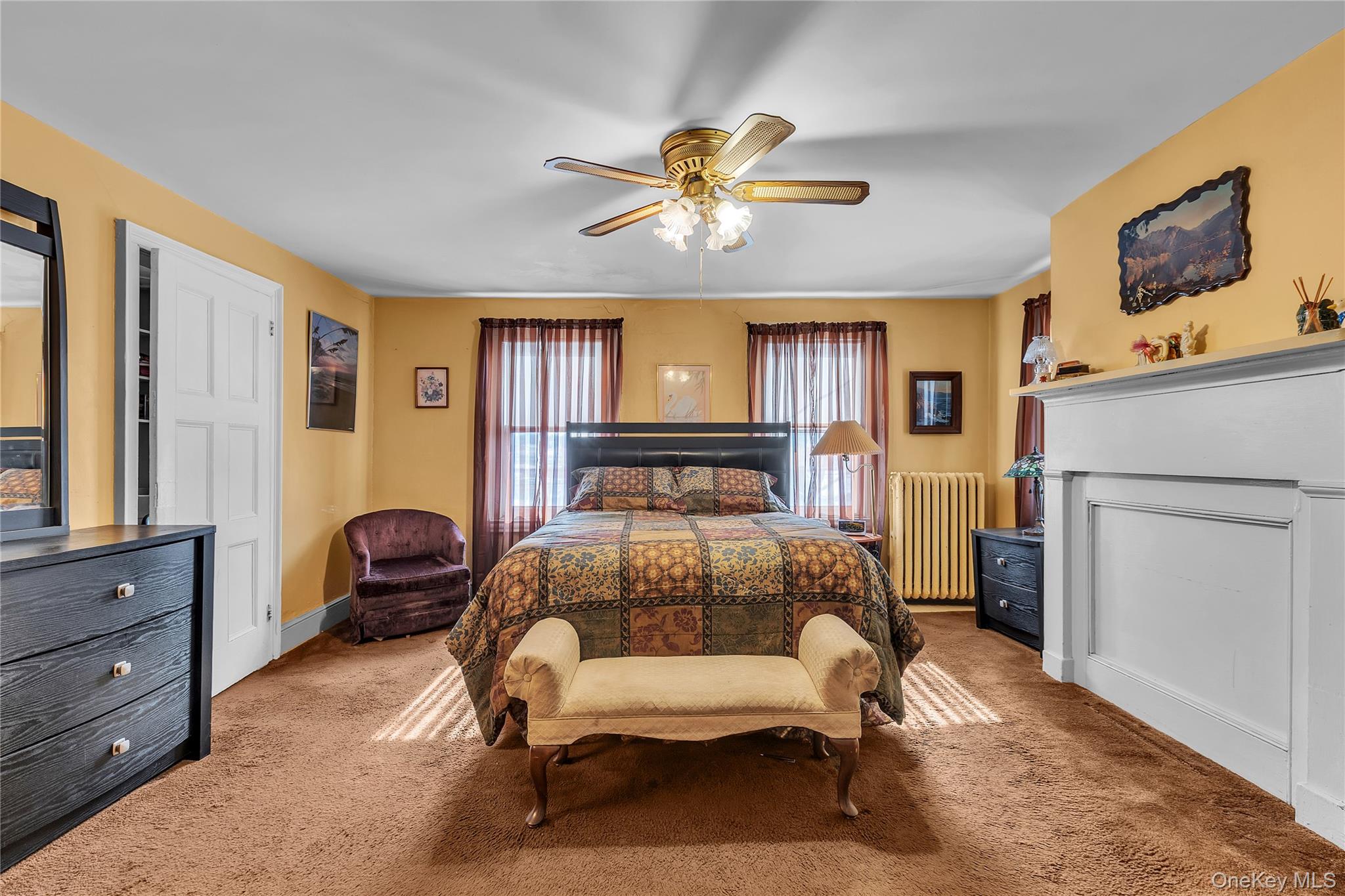 956 Paulding Street Peekskill, NY 10566 - Photo 15 of 27 a bedroom with furniture and a window