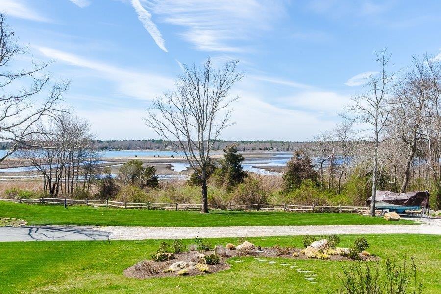 a view of a golf course with a big yard
