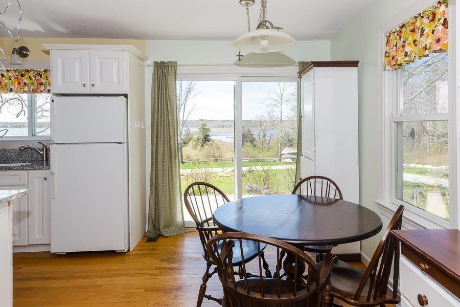 62 Converse Road Marion, MA 02738 - Photo 6 of 14 a view of a dining room with furniture window and outside view